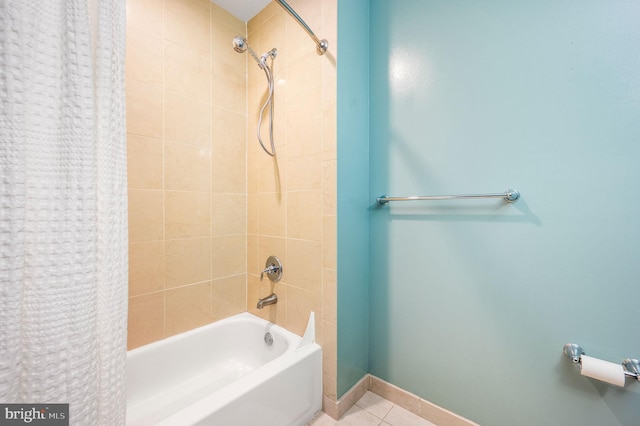 full bathroom featuring baseboards, shower / tub combo, and tile patterned flooring