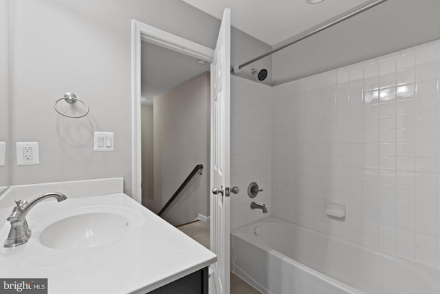 full bathroom featuring vanity and washtub / shower combination