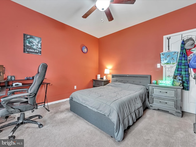 bedroom featuring a ceiling fan, carpet flooring, and baseboards