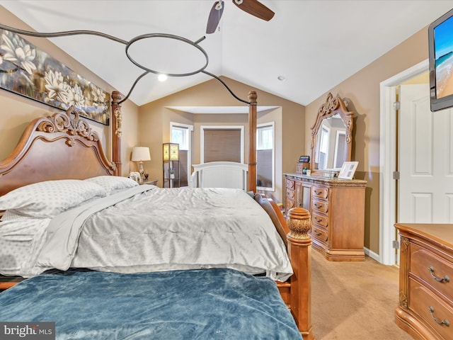 bedroom featuring lofted ceiling, light carpet, and a ceiling fan