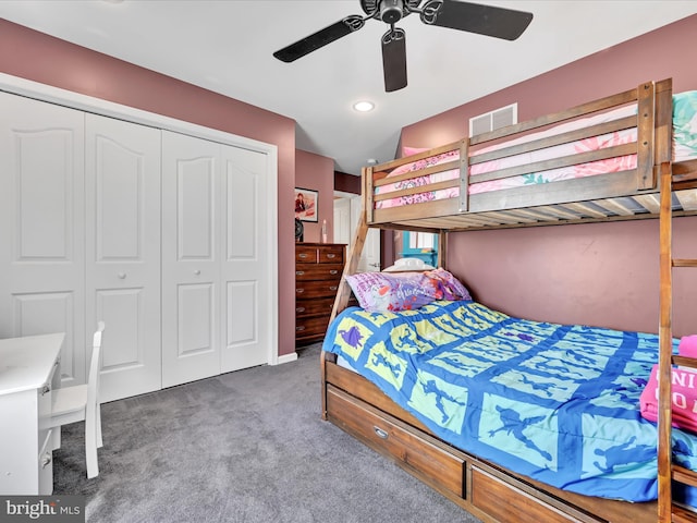 bedroom with a ceiling fan, a closet, carpet flooring, and visible vents