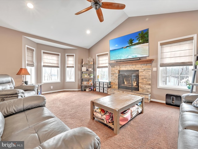 carpeted living room featuring baseboards, a ceiling fan, vaulted ceiling, a fireplace, and recessed lighting