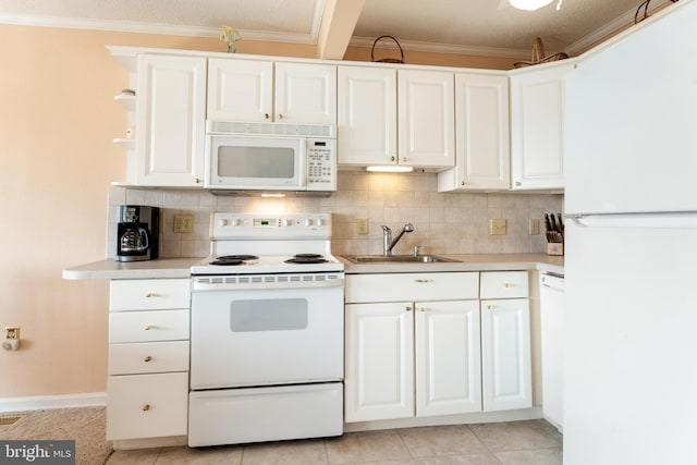 kitchen featuring white appliances, crown molding, and decorative backsplash