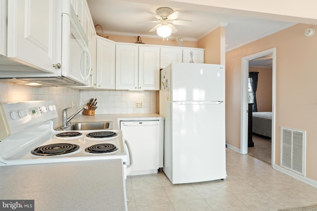 kitchen featuring ornamental molding, white appliances, visible vents, and white cabinetry