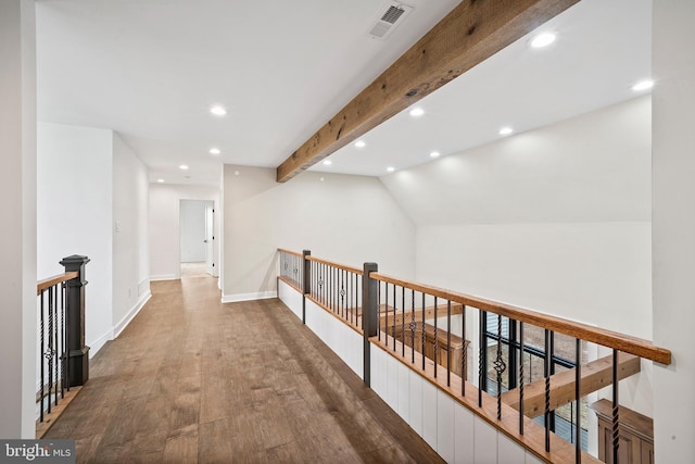 hall with recessed lighting, visible vents, an upstairs landing, wood finished floors, and baseboards