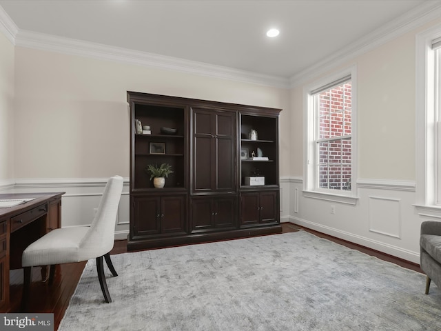 office area featuring a wainscoted wall, dark wood-style floors, and ornamental molding