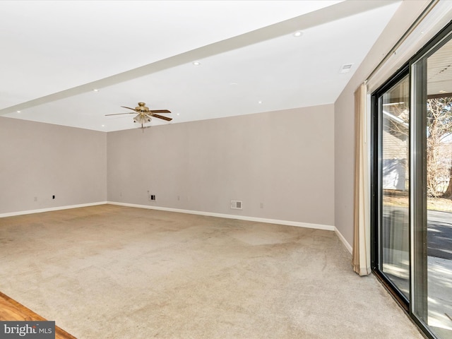 empty room featuring recessed lighting, visible vents, light carpet, ceiling fan, and baseboards