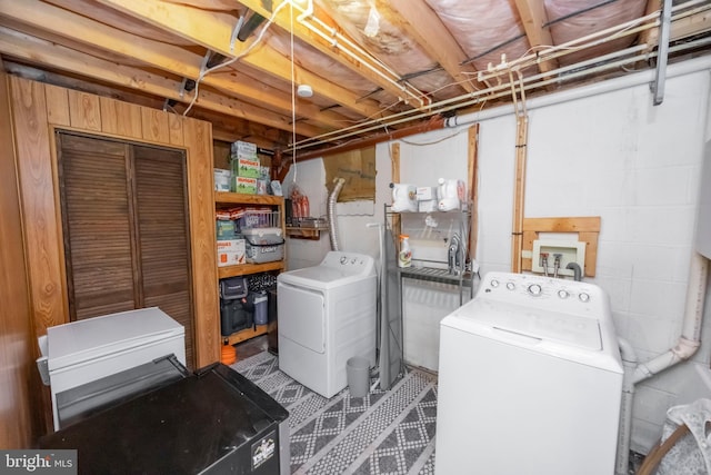 laundry area featuring laundry area and independent washer and dryer