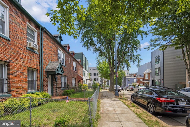 view of road with a residential view and sidewalks