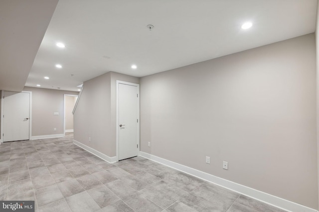 finished below grade area featuring recessed lighting and baseboards