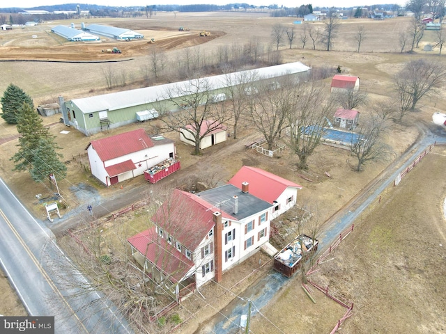 birds eye view of property featuring a rural view