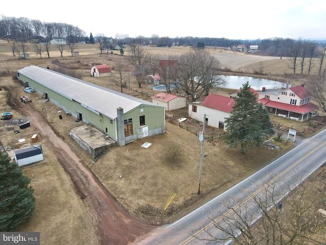 aerial view featuring a water view and a rural view