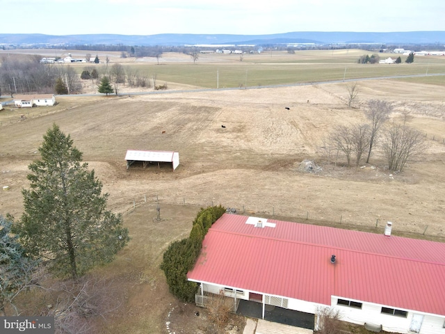 birds eye view of property featuring a rural view and a mountain view