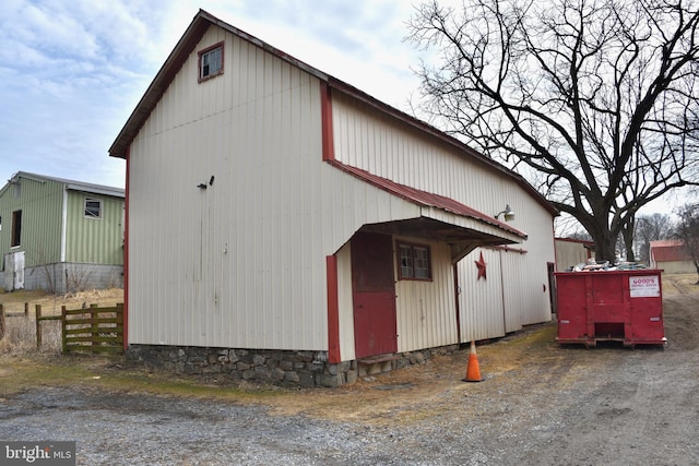 view of outdoor structure featuring an outdoor structure and fence