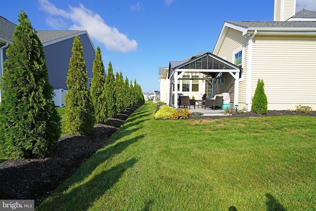 view of yard with a patio, a gazebo, and fence