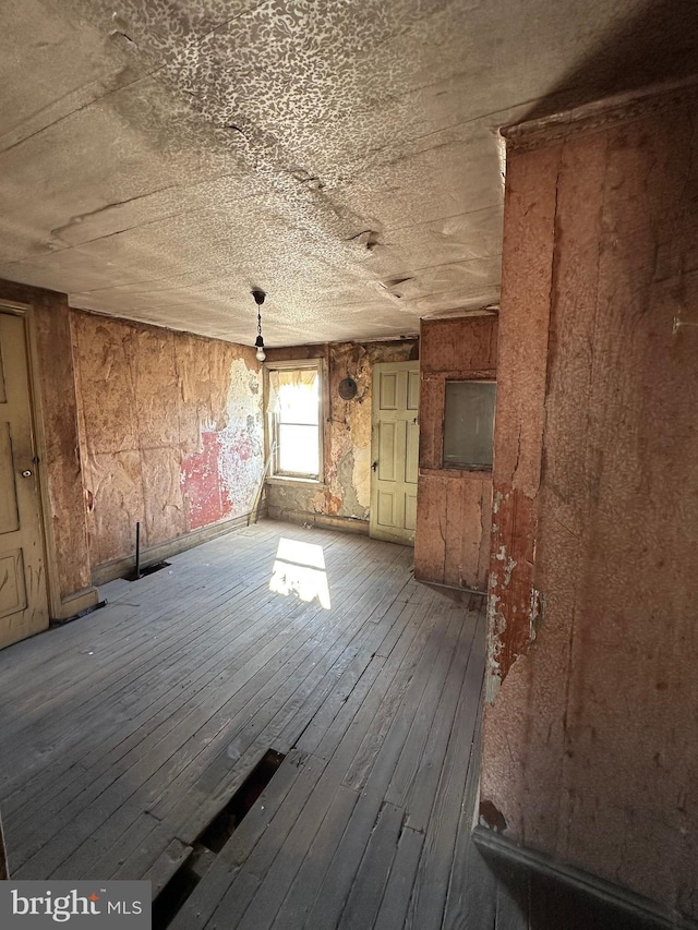 interior space with hardwood / wood-style flooring