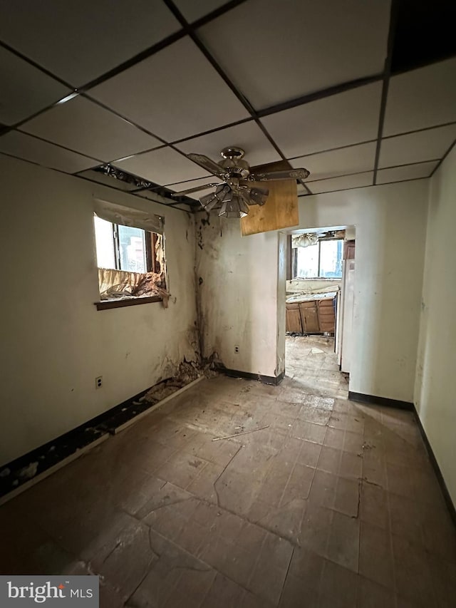 spare room featuring a drop ceiling