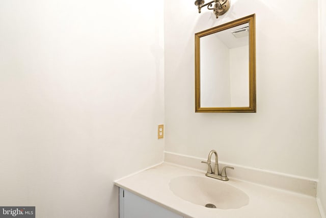 bathroom with visible vents and vanity