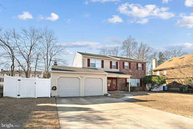 view of front of property with a porch, a garage, fence, driveway, and a gate