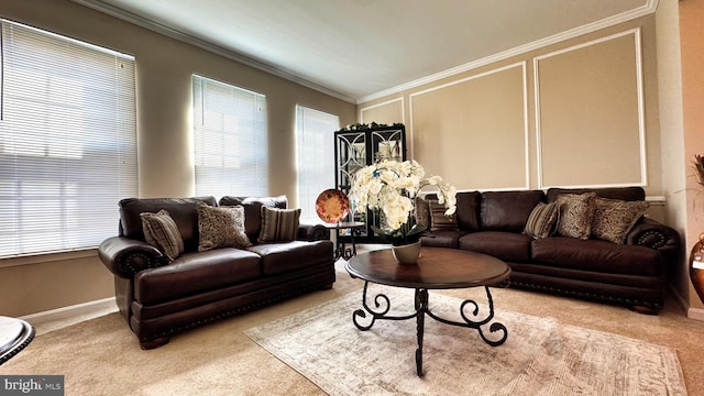 carpeted living room with baseboards and ornamental molding