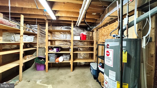 storage room featuring water heater