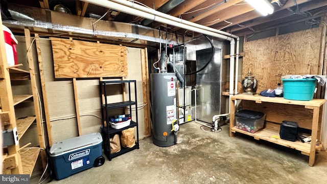 unfinished below grade area with gas water heater and heating unit