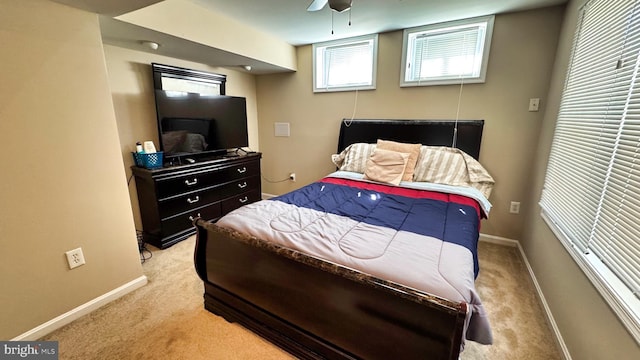 bedroom featuring baseboards, carpet floors, and ceiling fan