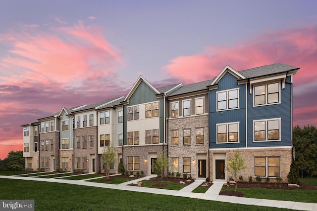 318 Ibis Ct Unit 2, Laurel, MD 20724 - townhome / multi-family property with a front lawn and brick siding
