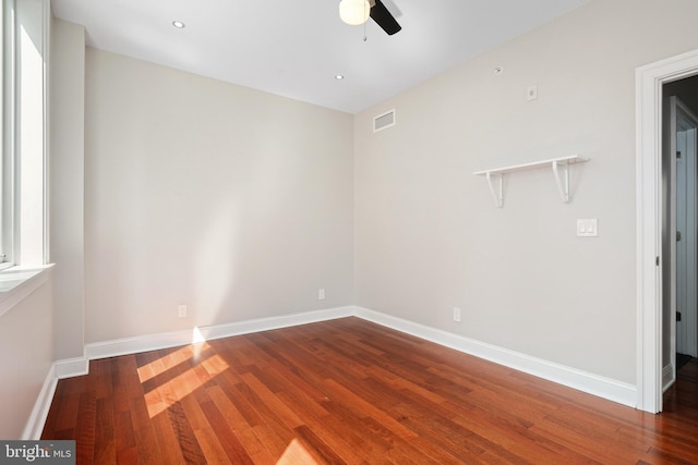 spare room featuring visible vents, baseboards, a ceiling fan, wood-type flooring, and recessed lighting