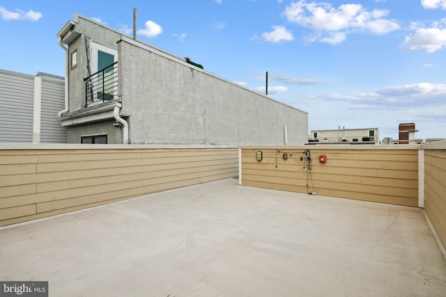 view of patio / terrace with a balcony