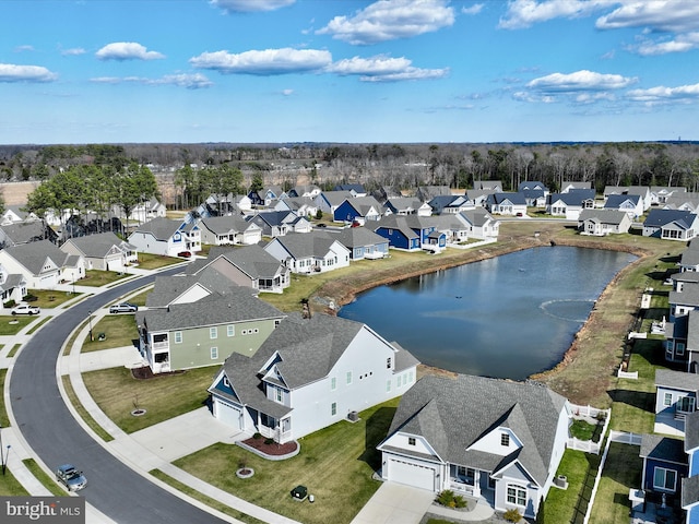 bird's eye view featuring a residential view and a water view