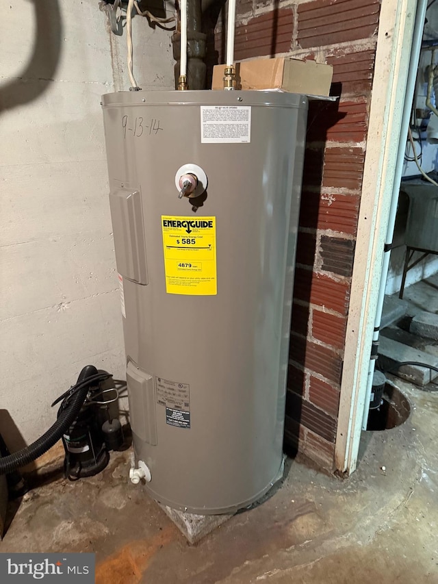 utility room featuring water heater