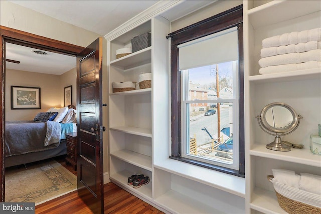 interior space featuring visible vents and wood finished floors