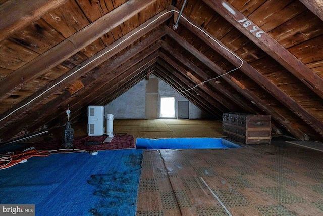 view of unfinished attic