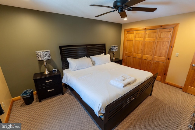 bedroom with baseboards, recessed lighting, ceiling fan, a closet, and light carpet