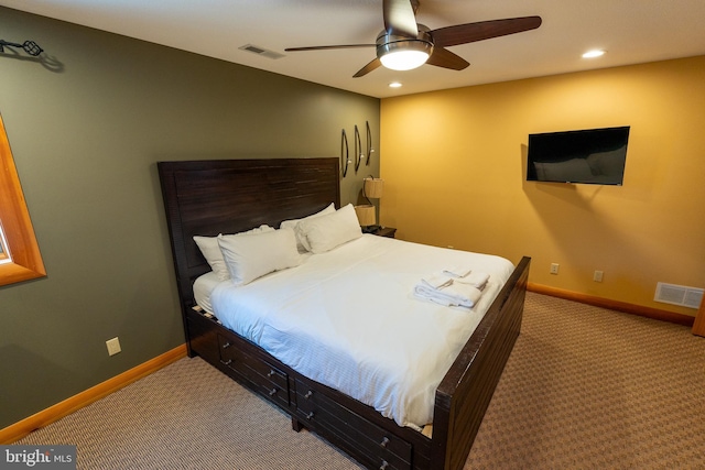 carpeted bedroom with visible vents, recessed lighting, and baseboards