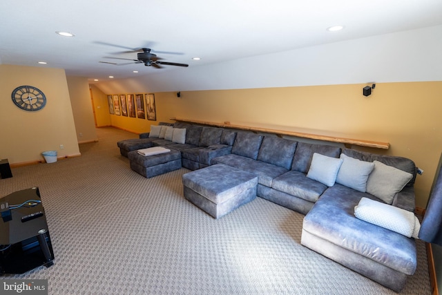 carpeted living area with a ceiling fan, vaulted ceiling, recessed lighting, and baseboards