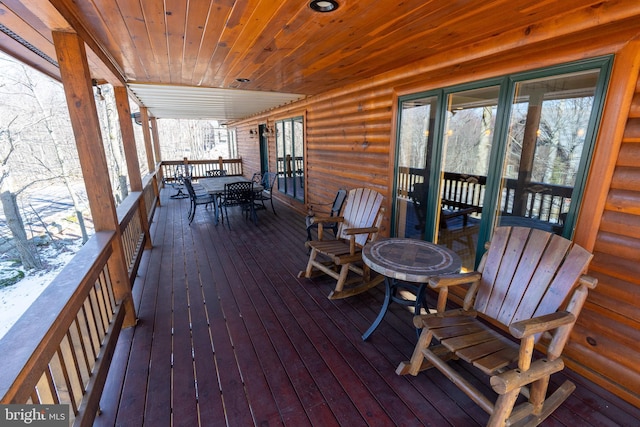 deck featuring outdoor dining space