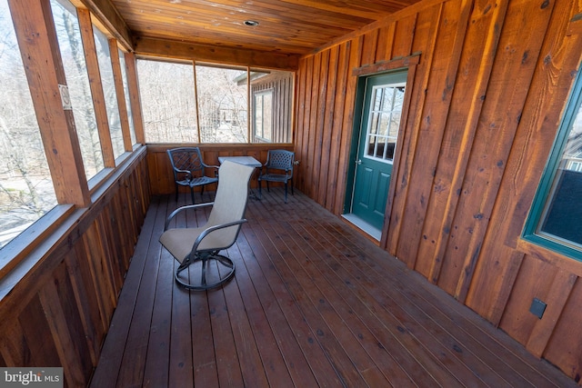 sunroom featuring wooden ceiling