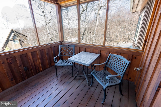 sunroom / solarium featuring plenty of natural light