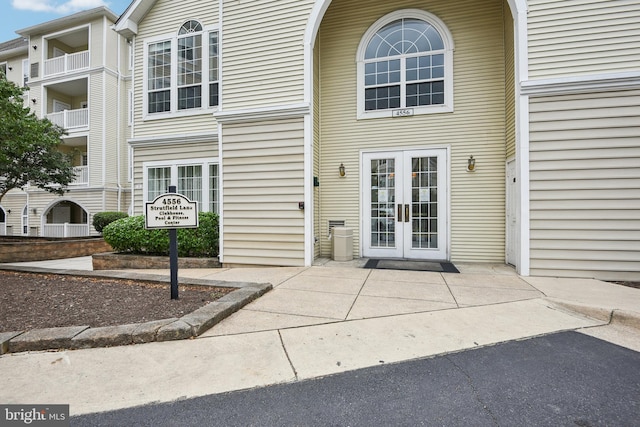 property entrance featuring french doors