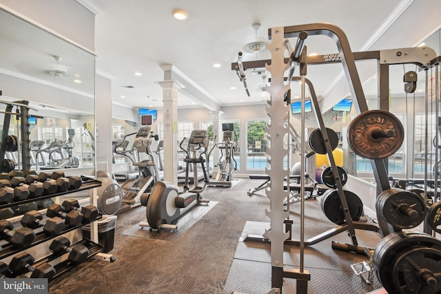 workout area featuring recessed lighting, ornamental molding, and ornate columns