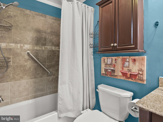 bathroom featuring shower / tub combo, vanity, and toilet