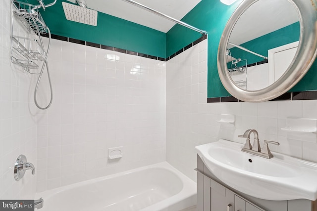 1029 Spruce St Unit 304, Philadelphia, PA 19107 - full bathroom featuring vanity, bathtub / shower combination, and tile walls