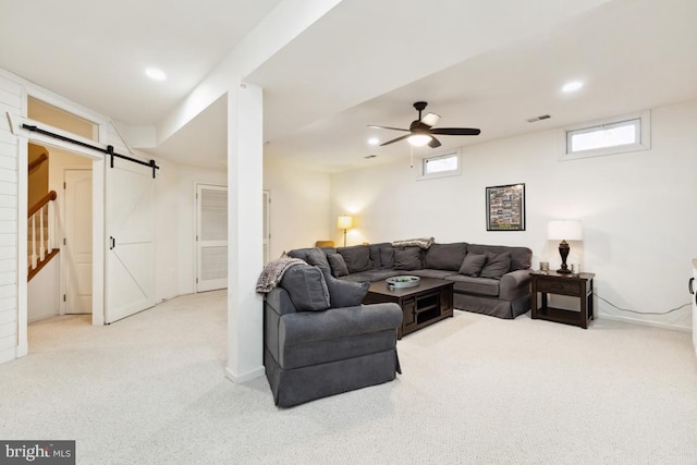 living room with visible vents, recessed lighting, a barn door, carpet, and ceiling fan