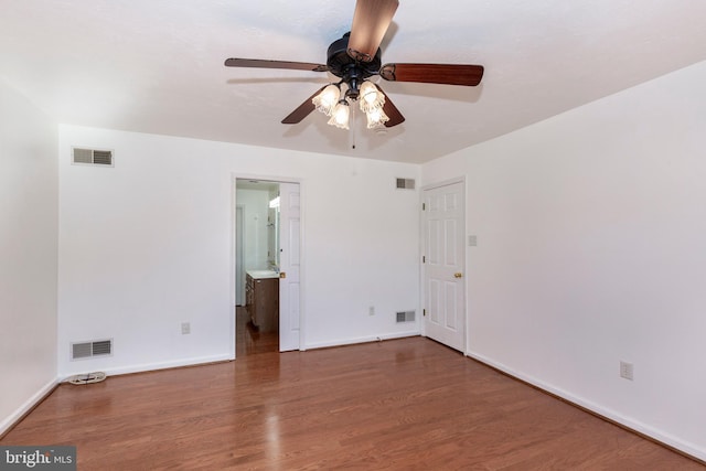 interior space featuring visible vents and wood finished floors