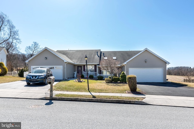 single story home featuring driveway, an attached garage, and a front lawn