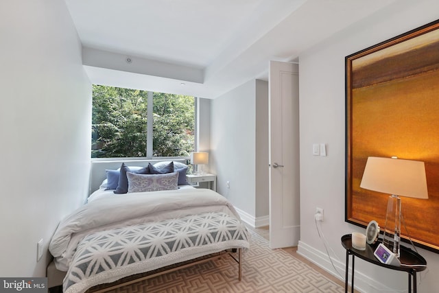 bedroom featuring baseboards