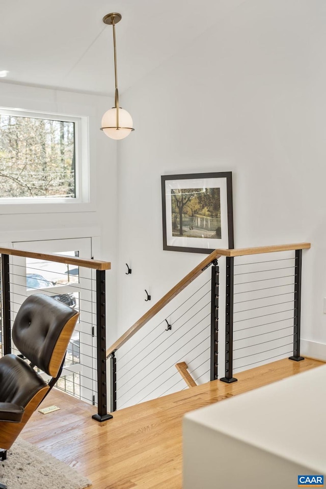 stairs with wood finished floors