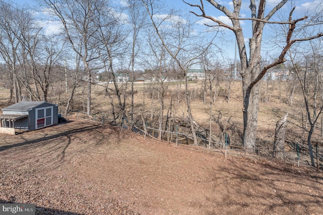 view of yard with an outdoor structure